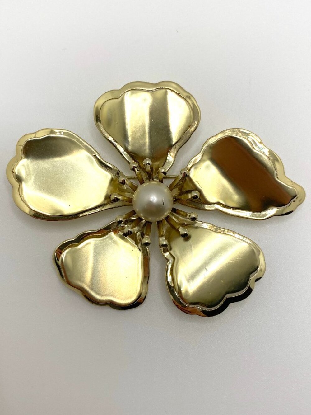 Vintage Brooch Gold Tone Metal Cutout Flower with Pearl Starburst MCM 60s